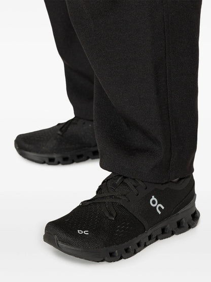 On Running Cloud X 4 sneakers in the Black Eclipse colorway