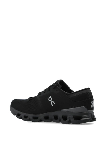 On Running Cloud X 4 sneakers in the Black Eclipse colorway