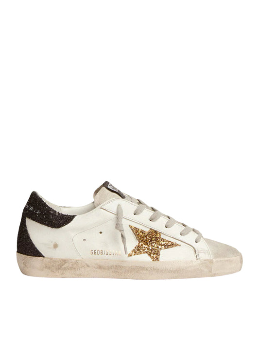 Golden   goose   Women’s   Super-Star   in   nappa   leather   with   gold   glitter   star   and   black   glitter   heel   tab